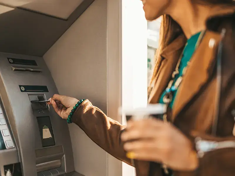 person using an atm
